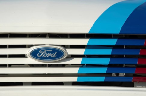 Nicosia Cyprus, October 29 2023: Classic ford car logo sign. Front view of white antique vehicle