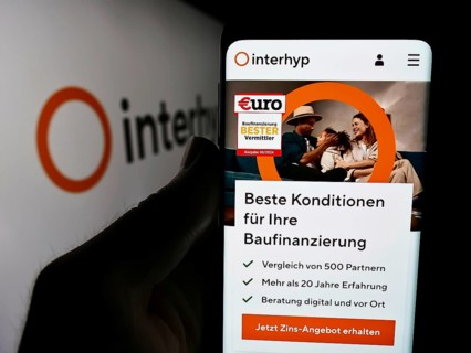 Stuttgart, Germany, 07-21-2024: Person holding cellphone with webpage of German mortgage brokerage