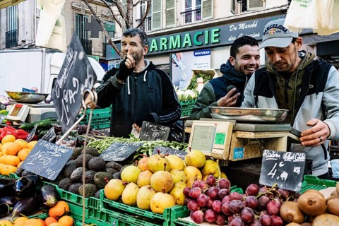 People selling fruit and vegetables, market in Noailles, Marseille