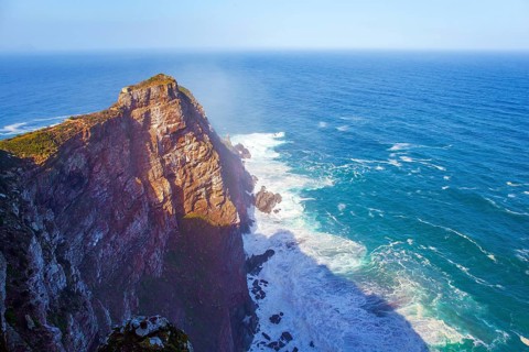 Bird's-eye view. South Africa. Powerful ocean surf. Cape of Good Hope at the southern tip of the