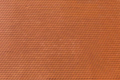 Closeup of new red color clay ceramic roof on building, background, Mikulov, Czech Republic, Europe