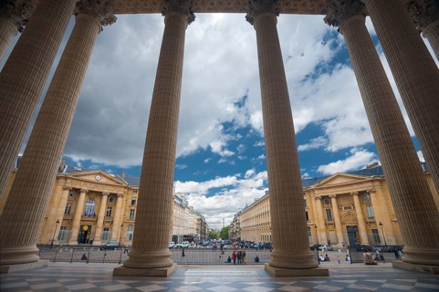 The grand columns of the Pantheon and neighboring Parisian buildings are uniquely seen from the