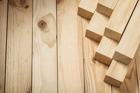 Wooden boards little square timber planks in little stack copy space view