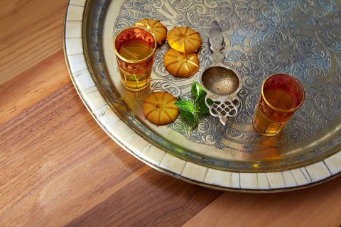 Green tea with mint Moroccan style on silver tray and biscuits