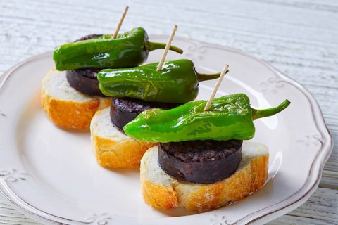 Pinchos Burgos morcilla with padron pepper tapas pintxos from Spain food