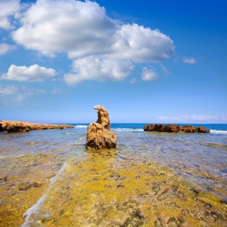 Denia Alicante Las rotas rocky beach in Spain and San Antonio Cape