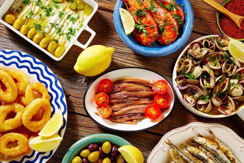 Tapas seafood clams shrimps calamari anchovies shrimps from Spain