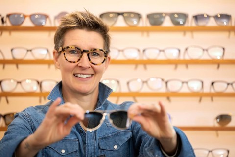 An image of a woman in a eyewear store