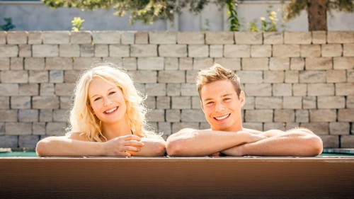 An image of a young couple at the pool