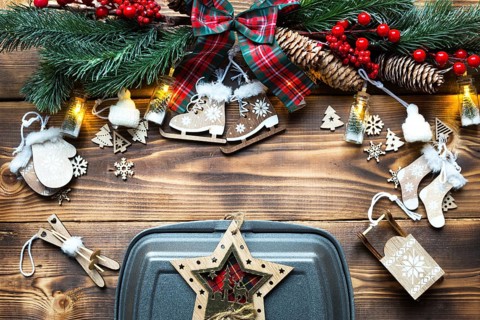 Christmas decor of food delivery service containers. New year's eve promotion. Ready-made hot