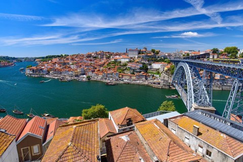 Dom Luis I Bridge, the River Douro, and the Ribeira district in Porto, Portugal, Europe