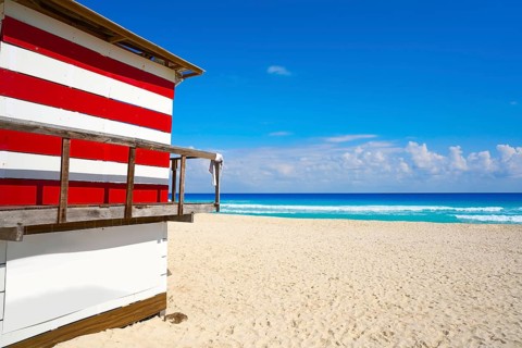Cancun Playa Delfines beach baywatch tower in Riviera Maya of Mexico