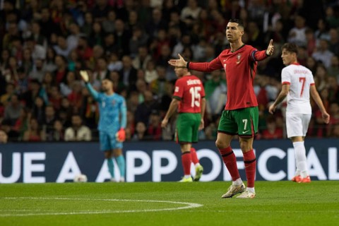 Football match, captain Cristiano RONALDO CR7 Portugal right with raised arms and looking to the