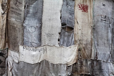 Torwache wrapped with old jute sacks, Check Point Sekondi Loco, by artist Ibrahim Mahama, documenta