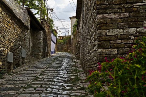 A view on buildings in Gjirokastra on a cloudy day