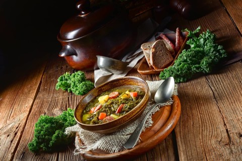 Rustic kale soup with meat and sausage