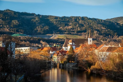 View of the historic city centre, old town of Leoben at the river Mur, Schwammerlturm and church St