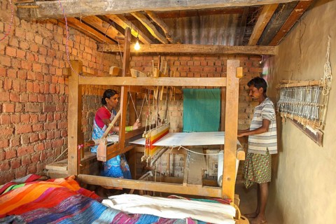 Woman weaving clothes on handloom, bastar, chhattisgarh, india, asia