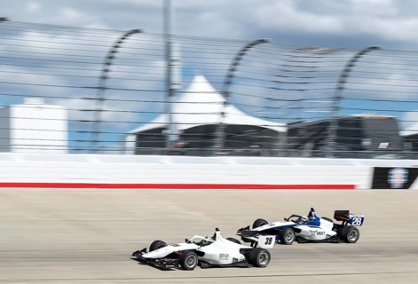 INDY NXT by Firestone Series driver, CHRISTIAN BROOKS (39) (R) of Santa Clarita, California races