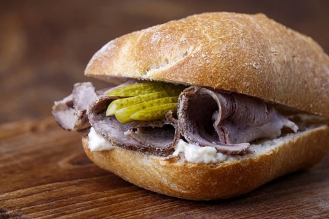 Cold roast pork in a roll