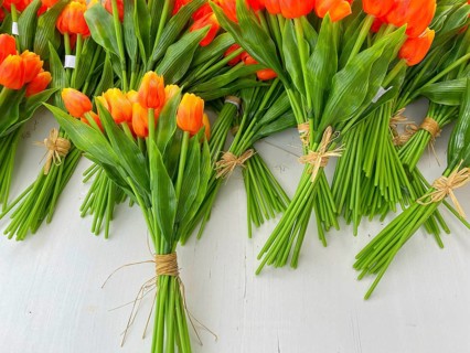 Wooden tulips in the shop in Volendam. Volendam is a town in North Holland, 20 kilometres north of