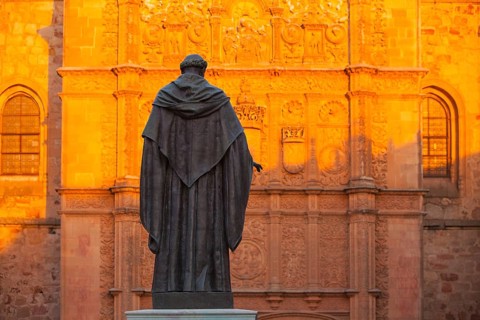 The priest statue in front of the New Cathedral of Salamanca, Spain, Europe