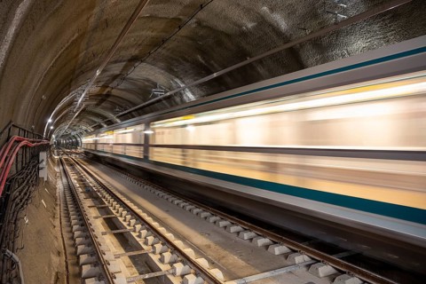 Subway tunnel rail tracks. Long exposure. Blurred lights