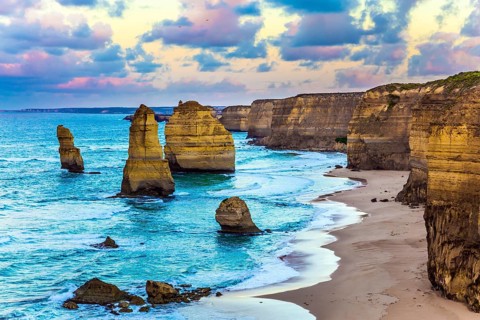 Early morning on the ocean coast. The clouds over the well-known rocks Twelve apostles. Travel to