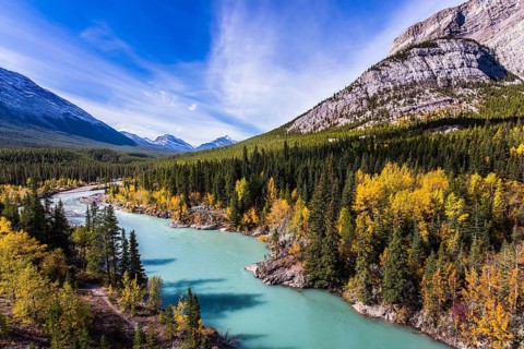 Abraham Lake is the most beautiful lake in the Rockies. Dense forests cover the lake shores. Warm