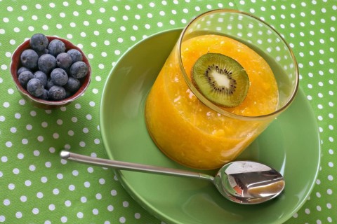 Orange and peach jelly in a glass