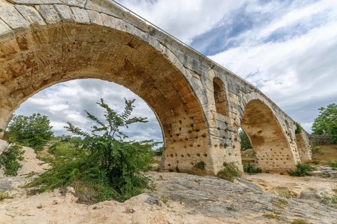 The Julien bridge, Roman bridge over the Calavon river. Roman bridge in the Luberon located on the