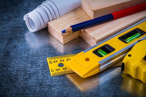 Great number of construction working tools on metallic scratched background architecture and