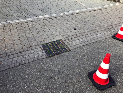 Inlet shaft for road drainage blocked by soil