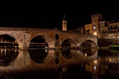 Beautiful Ponte Pietra in Verona at night, Italy, Europe