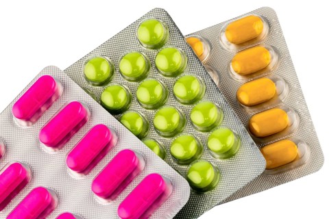 Colourful tablets in blister pack, symbolic photo for remedies and healthcare