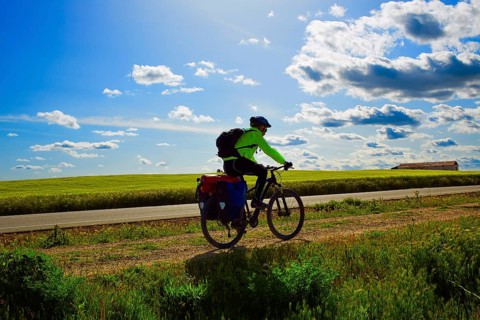 Biker on The Way of Saint James biking in Palencia Spain