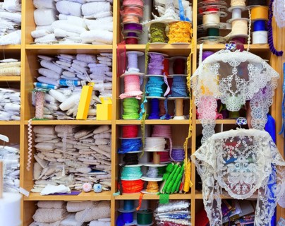 Valencia details of embroidery in old haberdashery in Plaza Redonda at Spain