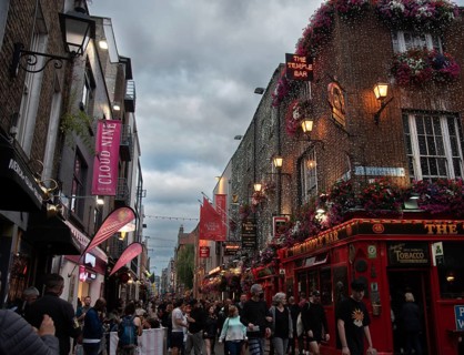 Ireland, Dublin, June 20 2022: People outside the famous Irish pub The Temple Bar in the centre of