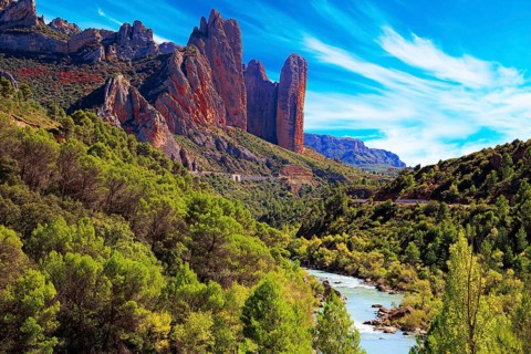 The magnificent Mallets of Riglos. The river Gallego flows through the gorge. Aragon. Romantic trip