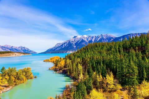 The picturesque Abraham lake in the mountain valley of the Rockies of Canada. Concept of active,