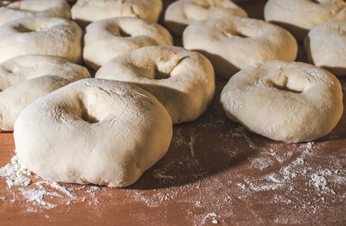 Kneading bagels close up