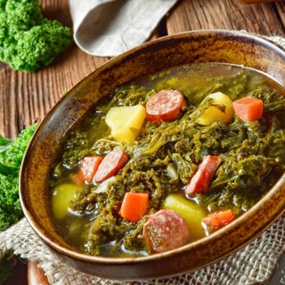 Rustic kale soup with meat and sausage