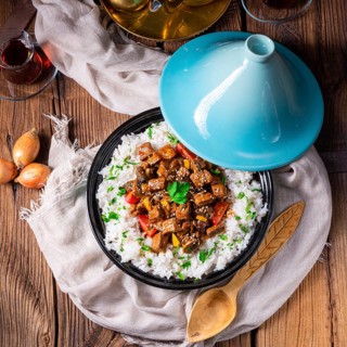 Tajin beef stew with rice, peppers and sesame seeds