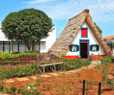Old house-museum of the first settlers on the island of Madeira. Charming white cottage with a