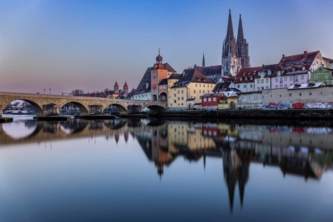 View over the Danube to the Regensburg Cathedral and the Stone Bridge in Regensburg, Bavaria,