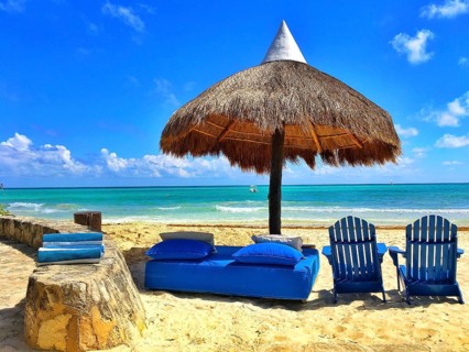Luxury blue beach chairs on the empty beach, Yucatan, Mexico, Central America