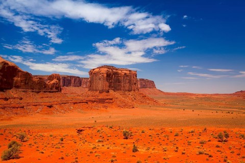 Iconic peaks of rock formations in the Navajo Park of Monument Valley in Utah