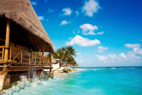 Playa del Carmen beach palapa in Riviera Maya Caribbean at Mayan Mexico