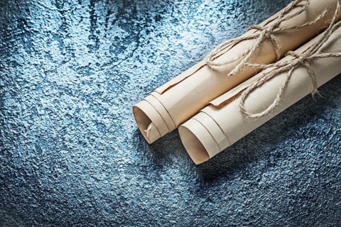 Vintage paper scrolls on black background