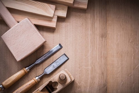 Variation of wooden joiner??™s working tools on wood board construction concept